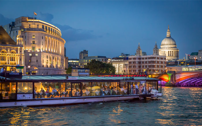 Dine by night on the river