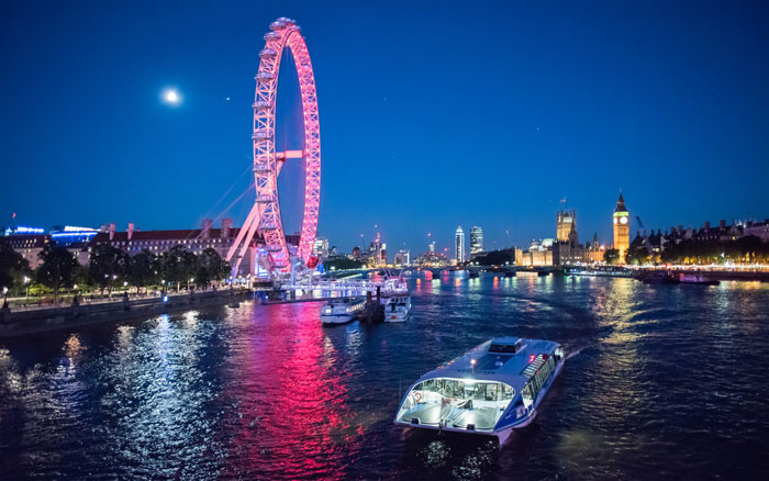 Enjoy the views of London from the river at night